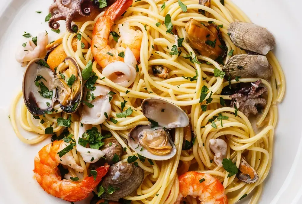 Variantes et astuces pour une recette de pâtes aux fruits de mer réussie