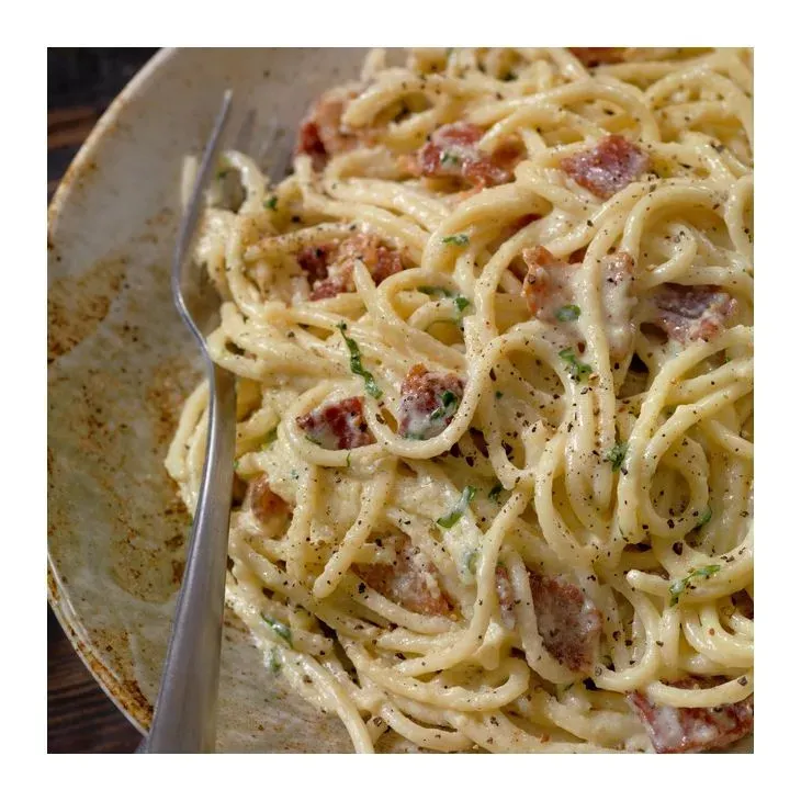 Variations et Astuces pour sublimer votre Recette de Spaghetti Carbonara
